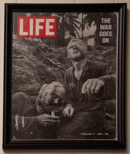 This graphic Life Magazine cover shows real combat during the Vietnam War.