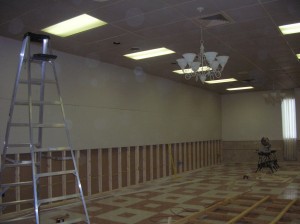 Installing the wall separating the ballroom from the museum.