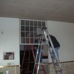 Installing the 100 year old window.