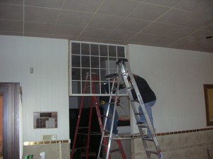 Installing the 100 year old window.