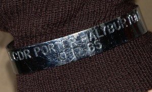 LCDR Porter Halyburton's POW bracelet was placed on his display by a museum visitor.