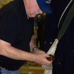 Even the contents of the pockets are authentic. Here the curator is retrieving the contents of the Revolutionary Way officer's pocket.