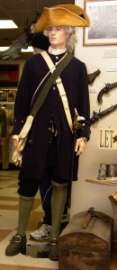 Lt. Col. in the District of Maine militia from 1776. One of only two reproduction uniforms in the museum. The re-enactors uniform is accurate down to the buttons. The weapons are authentic.