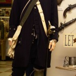 Lt. Col. in the District of Maine militia from 1776. One of only two reproduction uniforms in the museum. The re-enactors uniform is accurate down to the buttons. The weapons are authentic.