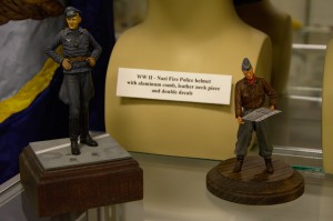 Two 1/32 scale models of German Officers during WW II. One is the famous Major Eric Hartmann of the Luftwaffe who shot down, in aerial combat, 352 enemy planes. A feat that had never been matched and will never be seen again. "The Blonde Knight Of Germany" spent 10 years as a prisoner of the Russians. The other figure is of a German Submarine officer.