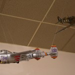 American P-38 with a British Spitfire in the background.