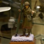 1/32 scale figure of a WWII US Army corpsman in combat at Bastogne during the Battle of the Bulge.