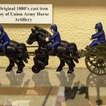 Original late 1870's to early 1880's child's cast iron toy of a Union Cavalry Artillery set of six horses, with riders on three, and two drivers riding the caisson towing the artillery piece.
