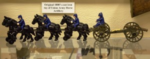 Original late 1870's to early 1880's child's cast iron toy of a Union Cavalry Artillery set of six horses, with riders on three, and two drivers riding the caisson towing the artillery piece.
