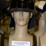 World War II Nazi Fire Police helmet with aluminum comb, leather neck piece and decals