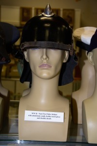 World War II Nazi Fire Police helmet with aluminum comb, leather neck piece and decals