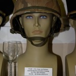 US Air Force/US Army steel helmet used during parachute training by Lt. Col. Dave Hatcher, POW 05-30-1966 to 02-12-1973.