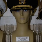 US Navy Field Grade officer's service cap with black cover worn by Capt. Cole Black, POW 06-21-1966 to 02-12-1973.