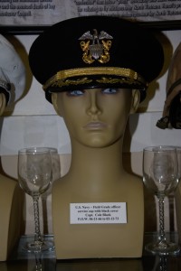 US Navy Field Grade officer's service cap with black cover worn by Capt. Cole Black, POW 06-21-1966 to 02-12-1973.
