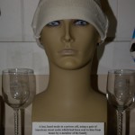 A hat, hand made in a prison cell using a pair of sweat socks by Col. Larry Chesley, US Air Force, POW 04-16-1966 to 02-12-1973.