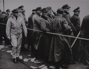 Smiling German prisoners aboard a U.S. Coast Guard ship at Normandy.
