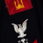 The Navy's Normandy (D-Day) patch on the shoulder of MoMM 2/C Robert Maclellan, USN.