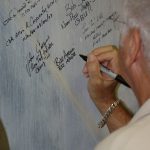 Capt Arcuri Signs the POW Wall